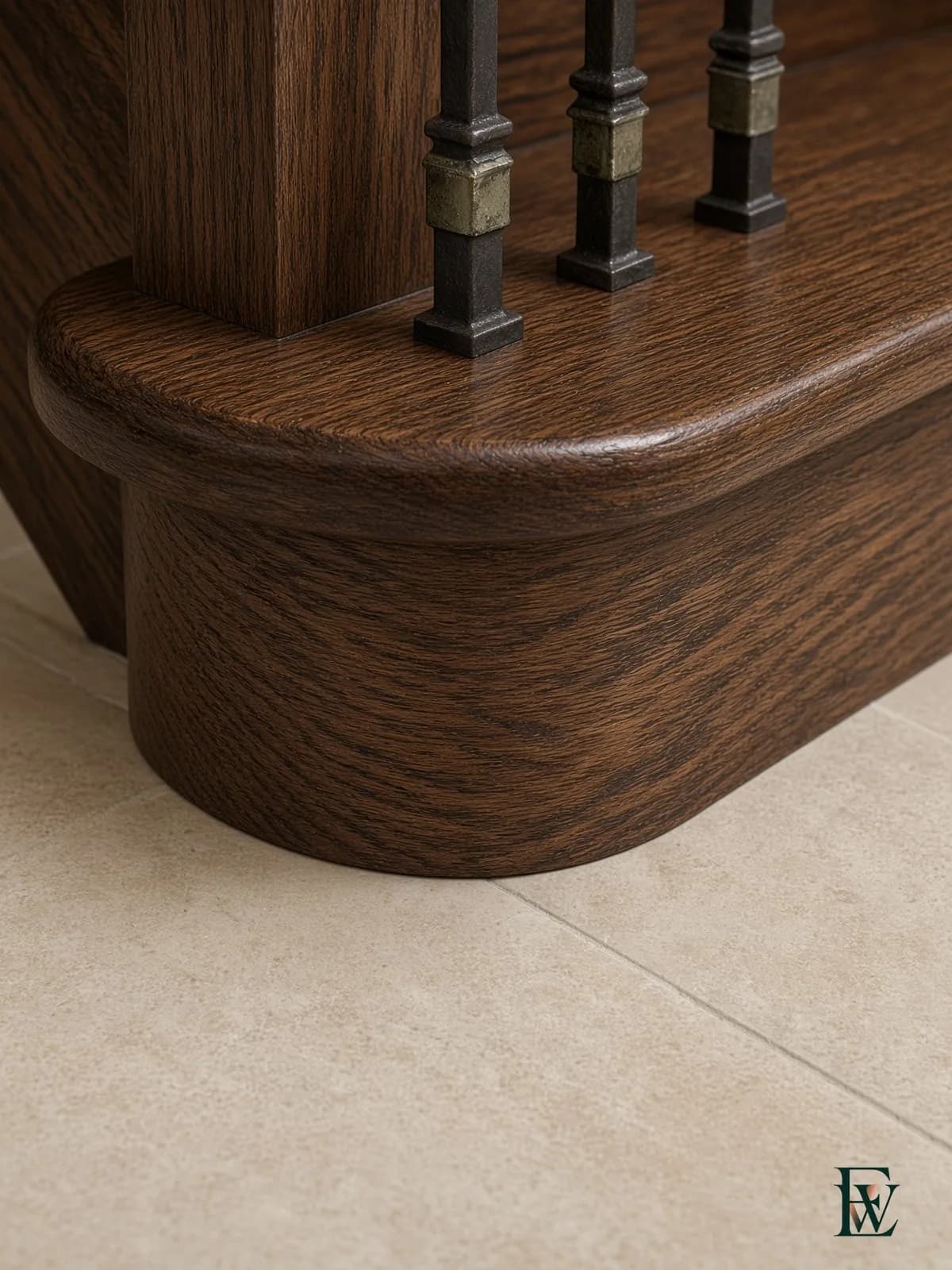 Oak treads meeting stone foyer tile, frame 2 of 3, camera approaching the material transition, Ecowoods site work, Toronto.