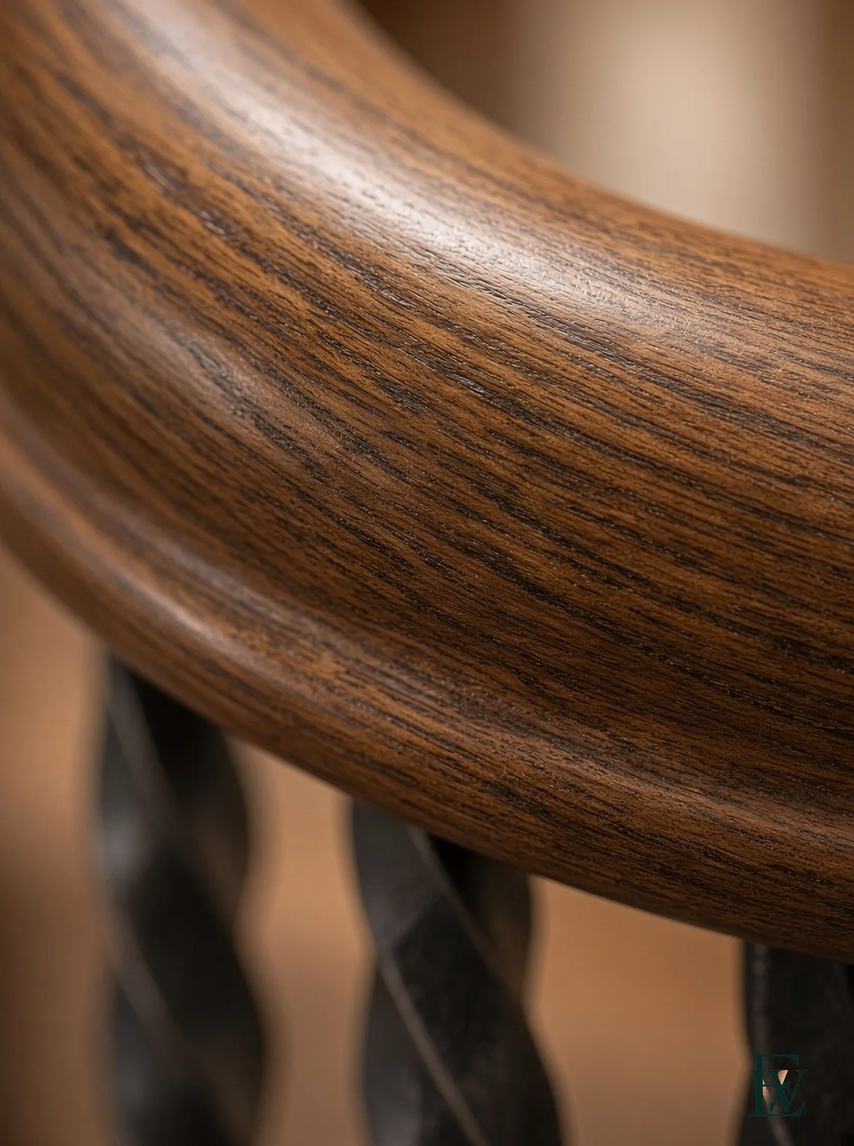 Steam-bent oak handrail, frame 3 of 3, macro of the rail profile at hand height, Ecowoods site work, Toronto.
