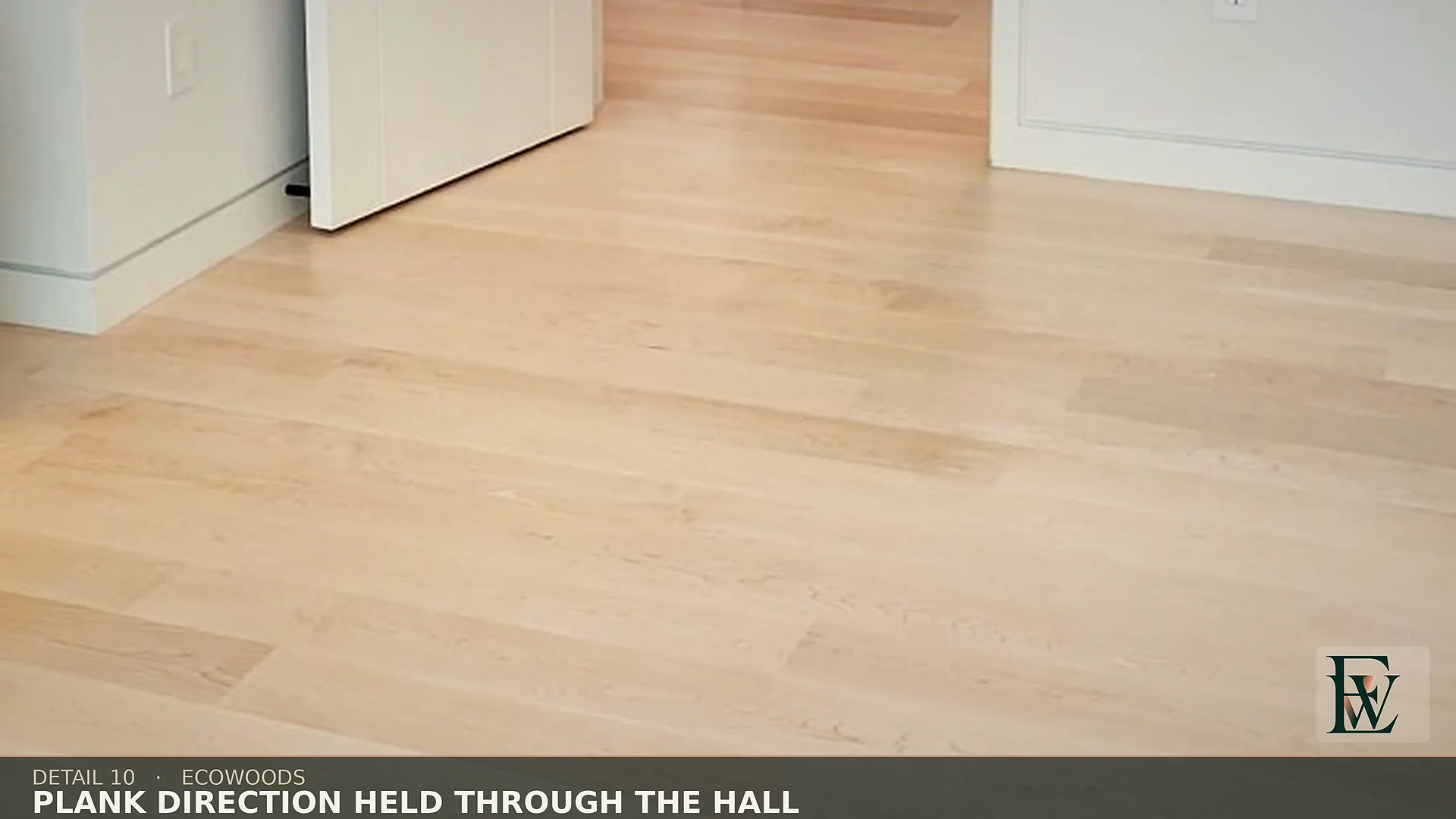 Board direction held along the long axis of the house through an upper hallway.