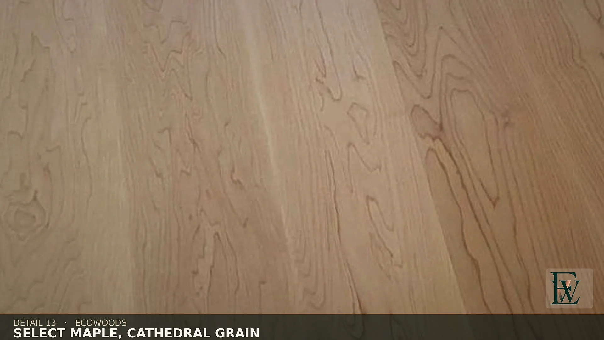 Select-grade hard maple in satin finish, showing the cathedral grain used through the house.