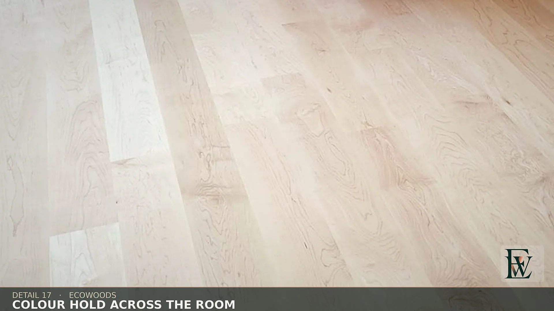 Sorted maple boards holding one cream tone from the doorway across the room.